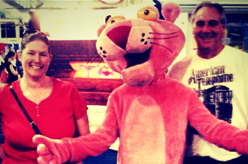 2013 Improveit Sweepstakes winners posing with the Owens Corning Pink Panter at the Ohio State Fair